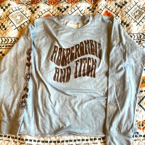 Abercrombie Kids long sleeve shirt with flowers on right sleeve size 11/12